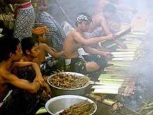 Humans living in Bali, Indonesia, preparing a meal Preparing The Feast.jpg