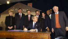 Congresswoman Harris joins President George W. Bush and other members of Congress at the bill signing ceremony for the American Dream Downpayment Act President George W. Bush signs the American Dream Downpayment Act.png