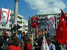 Ataturk Square, North Nicosia in 2006, with the Northern Cyprus and Turkish flags. Pro-TRNC demonstration in Sarayonu North Nicosia.jpg