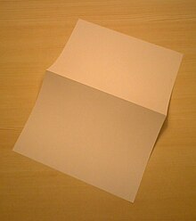 An A4 paper sheet folded into two A5 size pages Schnellaktendeckel03.jpg