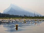 Mount Rundle through the haze of wildfire smoke, as seen from the middle of Vermilion Lake one