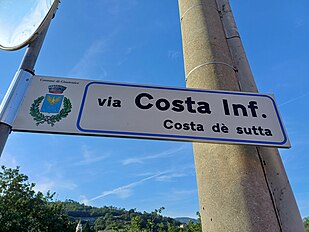 A Còsta de Sutta (Giüstéxine), Cartéllu in italiàn e lìgüre