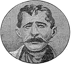 Portrait en médaillon d'un homme portant une grande moustache en guidon de vélo.