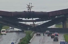 A destroyed railway flyover, 25 July 2014 Blown up railway bridge in Donbass.jpg