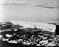 Image 85An iceberg being pushed out of a shipping lane by (L to R) USS Burton Island, USS Atka, and USS Glacier near McMurdo Station, Antarctica, 1965 (from Southern Ocean)