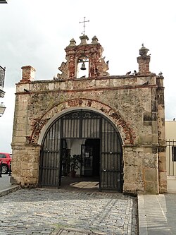 Photograph of the Capilla del Cristo, at the end of a cobblestone street