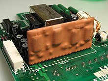 An epoxy encapsulated hybrid circuit on a printed circuit board. Hybridcircuit.jpg