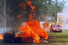 Vue d'une monoplace en feu à Imola