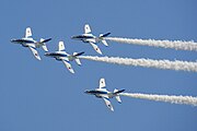 Japan air self defense force Kawasaki T-4 Blue Impulse RJST Single Cloverleaf Turn.jpg