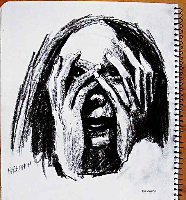 Photo of a drawing of a face and two hands