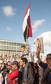 Protesters in San Francisco with Yemeni national flag in support of the Muslim community of Yemen and other countries affected by the executive order NoBanNoWall SF 20170204-1843.jpg