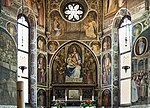 Church altar, covered by frescos