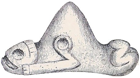 Three-pointed stone Cemí is a specimen which was owned by Mr. Yunghannis, of Bayamón, Puerto Rico[1]