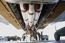 B-52H bomb bay: AGM-69 SRAM missiles (front) and B28 nuclear bombs (background), as a downloading takes place during Exercise GLOBAL SHIELD '84 B-52H Bomb Bay - 1984 at Ellsworth AFB.jpg