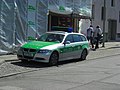 BY Streifenwagen BMW 3er in grün-silberner Farbgebung