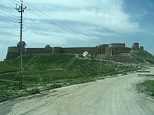 The Tal Afar Citadel (pictured in 2006) was partially obliterated in December 2014 Tal Afar Castle.jpg