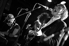 Pitchfork is credited for launching the careers of indie rock bands such as Arcade Fire (pictured in 2005). Arcade Fire live 20050315.ext.jpg