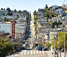 The Castro is famous as one of the first gay villages in the country. Entering the Castro district, San Francisco (31984322697) (cropped).jpg