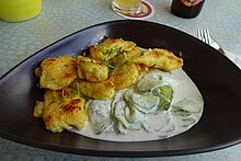 Flour dumplings with cucumber salad