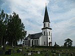 Foto einer Kirche mit Friedhof