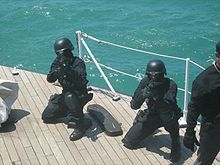 Police Counter-terrorist Force Pasukan Gerakan Khas during stormed the patrol vessel drill. LatihanSerbuanPGK.jpg