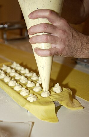 Making ravioli with a ravioli maker
