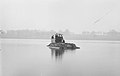 Mark IX Tank Amphibious Conversion in Welsh Harp Reservoir, with all of its passengers out on top
