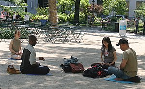 Meditating in Madison Square Park, Manhattan, ...