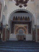 The Mihrab (Prayer niche) where the Imam stands and leads Islamic congregational prayers (Salah).