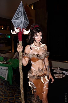 Fan cosplay of the League of Legends champion Nidalee Nidalee (9844717146).jpg