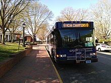 Northline Express (NLX) bus of the University Transit Service, with signage celebrating victory at the 2019 NCAA tournament championship ("March Madness") Northline Express (NLX) bus of the University Transit Service of the University of Virginia - IMG 20190410 091527.jpg