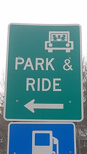 Typical park-and-ride sign in the United States, this one located at the interchange between Interstate 79 and Pennsylvania Route 488 in Portersville, Pennsylvania north of Pittsburgh. Such services are used to encourage carpooling. Park and Ride United States.jpg
