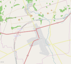 Mapa konturowa Szczuczyna, w centrum znajduje się punkt z opisem „Muzeum Pożarnictwa w Szczuczynie”