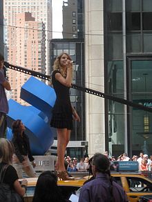 While popular music is full of reproductive messaging, it remains debated whether or not musical talent is a sexually selected trait or a by-product of other evolved characteristics. Taylor Swift at 2009 MTV VMA's 2.jpg