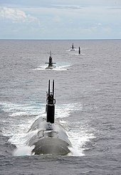 USS Charlotte, a Los Angeles-class submarine runs with submarines from partner nations during RIMPAC 2014. USS Charlotte (SSN 766) steams in a close formation at RIMPAC 2014.jpg