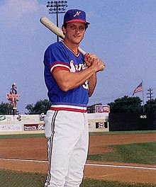 A baseball player in blue and white