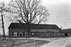 Boerderij van het Kempische langgeveltype, rieten wolfdak met voet van pannen, in de kopgevel in baksteen