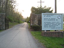 Federal Prison Camp, Alderson is the largest employer in the Alderson area Alderson Federal Prison Camp entrance.jpg