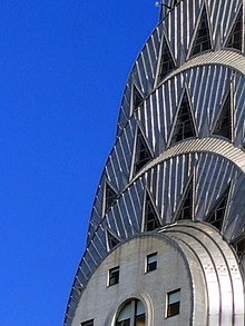 The pinnacle of New York's Chrysler Building, the world's tallest steel-supported brick building, is clad with stainless steel. Chrysler Building detail.jpg