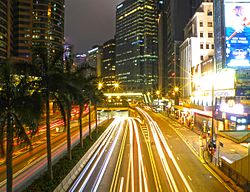 Connaught Road Central near Exchange Square at night.jpg