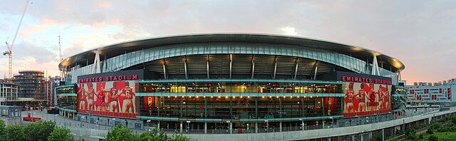 External view of the East side of the Emirates Stadium at dusk