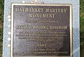 National Historic Landmark plaque, at site of the Haymarket Martyrs' Monument; added in 1997.
