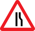 Road narrows on right side