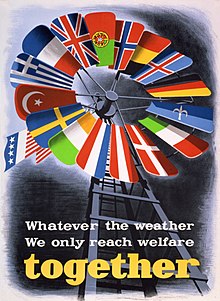 One of the numerous posters created to promote the Marshall Plan in Europe. Note the pivotal position of the American flag. The blue and white flag between those of Germany and Italy is a version of the Trieste flag with the UN blue rather than the traditional red. Marshall Plan poster.JPG