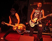 Rancid live 
in 2008. Pictured are Tim Armstrong, Lars Frederiksen and Branden 
Steineckert (back).