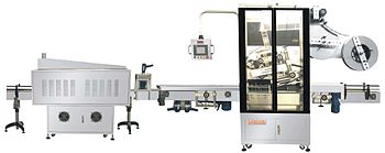 English: machine for sleeve labeling