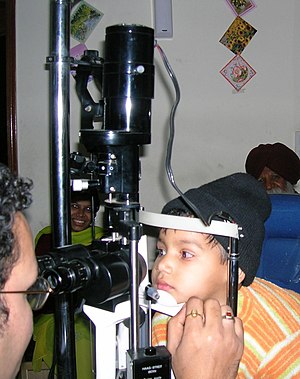 "Slit lamp examination of Eyes in an Opht...