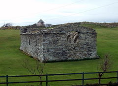 Stone chapel with walls but no roof