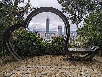 Taipei 101, framed in elephant-shaped bench at summit
