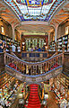 The interior of the store, showing skylight, staircase and book shelves